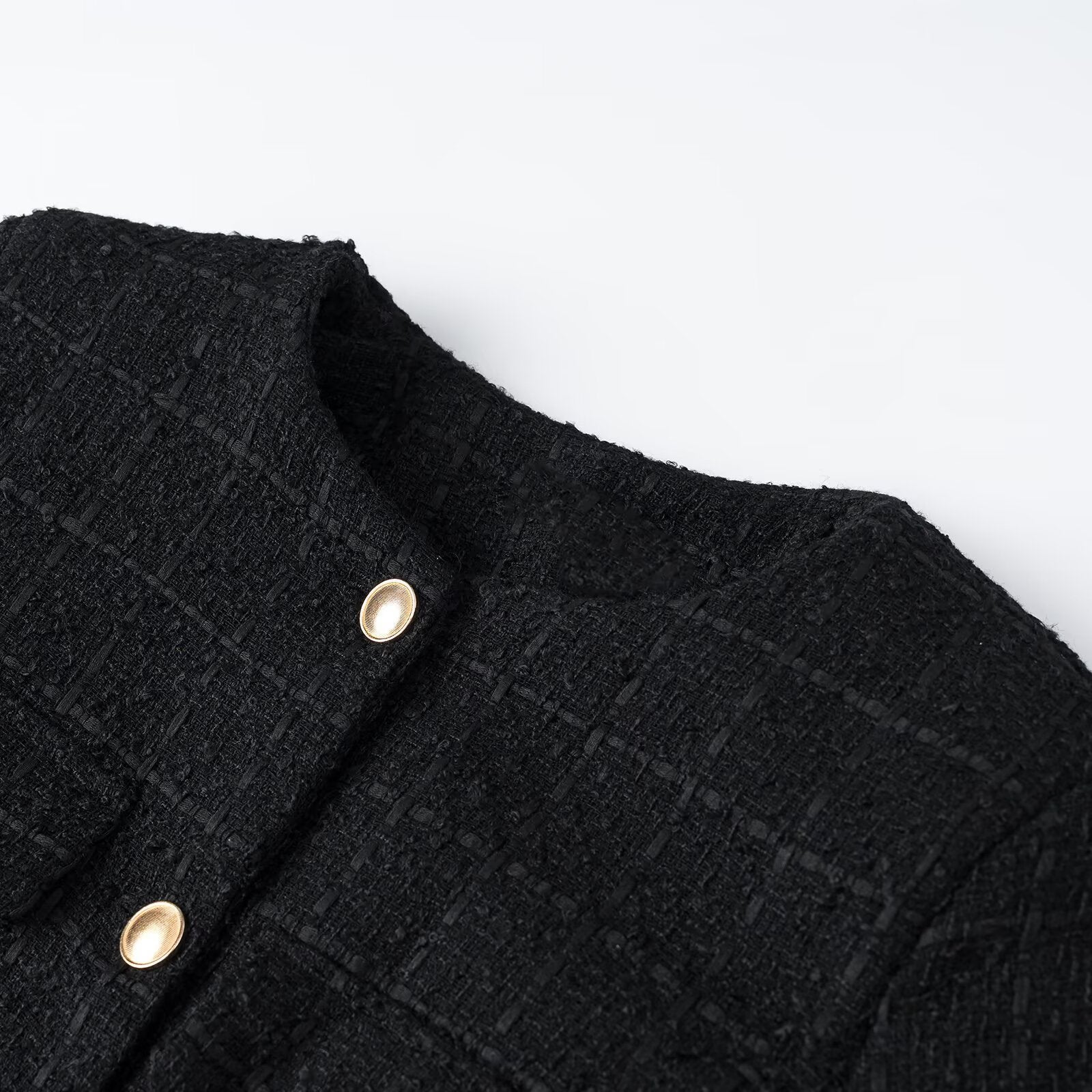 Ladies short jacket made of bouclé tweed with round neck, golden decorative buttons and tie belt Chichicherry