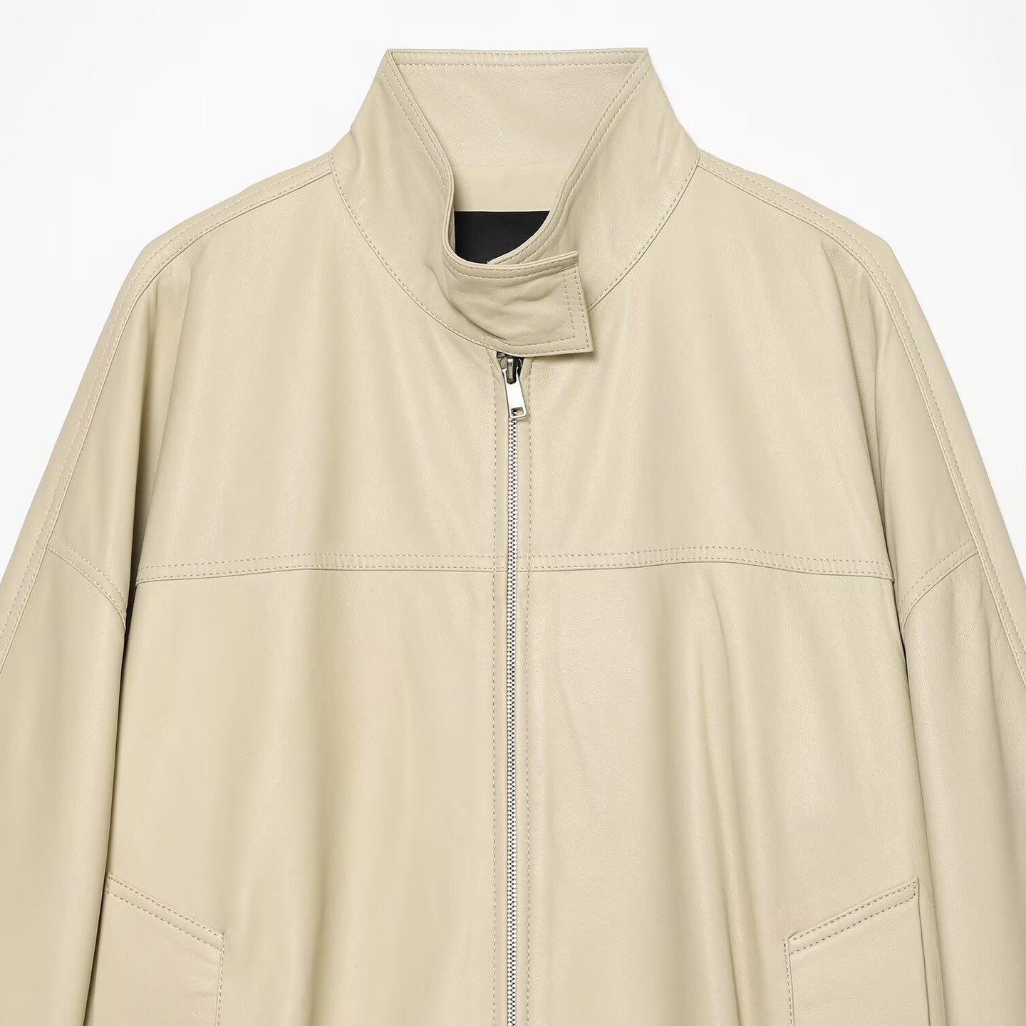 Women's loosely cut leather-look transitional jacket with stand-up collar, two-way zipper, and kangaroo pockets Chichicherry