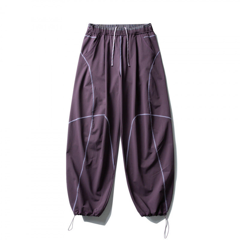 Unisex locker cut tech jogging pants with elastic waistband, distinctive flatlock seams and drawstring Chichicherry