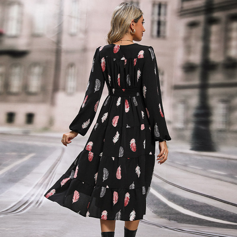 Women's midi dress with V-neck, three-quarter sleeves, tiered skirt, and feather pattern Chichicherry