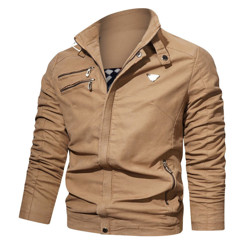 Men's lightweight canvas utility blouson with stand-up collar, asymmetrical chest zip section, and decorative zippers.