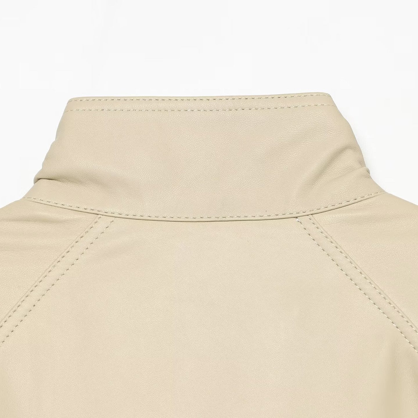 Women's loosely cut leather-look transitional jacket with stand-up collar, two-way zipper, and kangaroo pockets Chichicherry