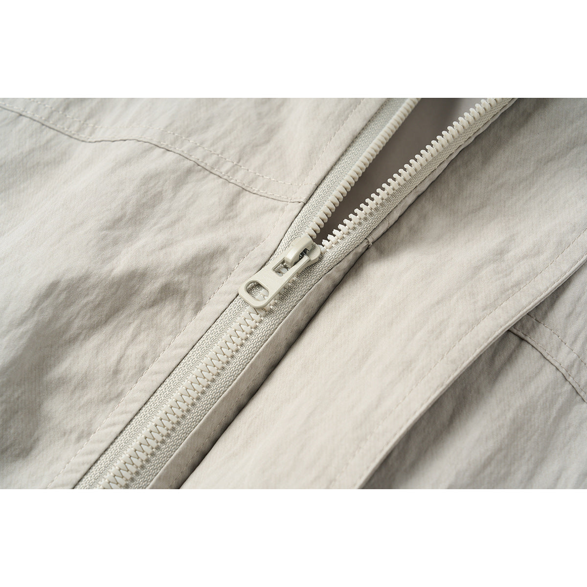 Unisex Short Jacket in minimalist Workwear look with high stand-up collar and snap button closure Chichicherry