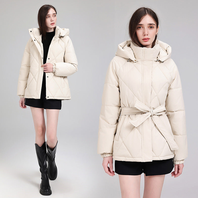 Women's luxury short puffer jacket with integrated wind protection collar and waist belt Chichicherry