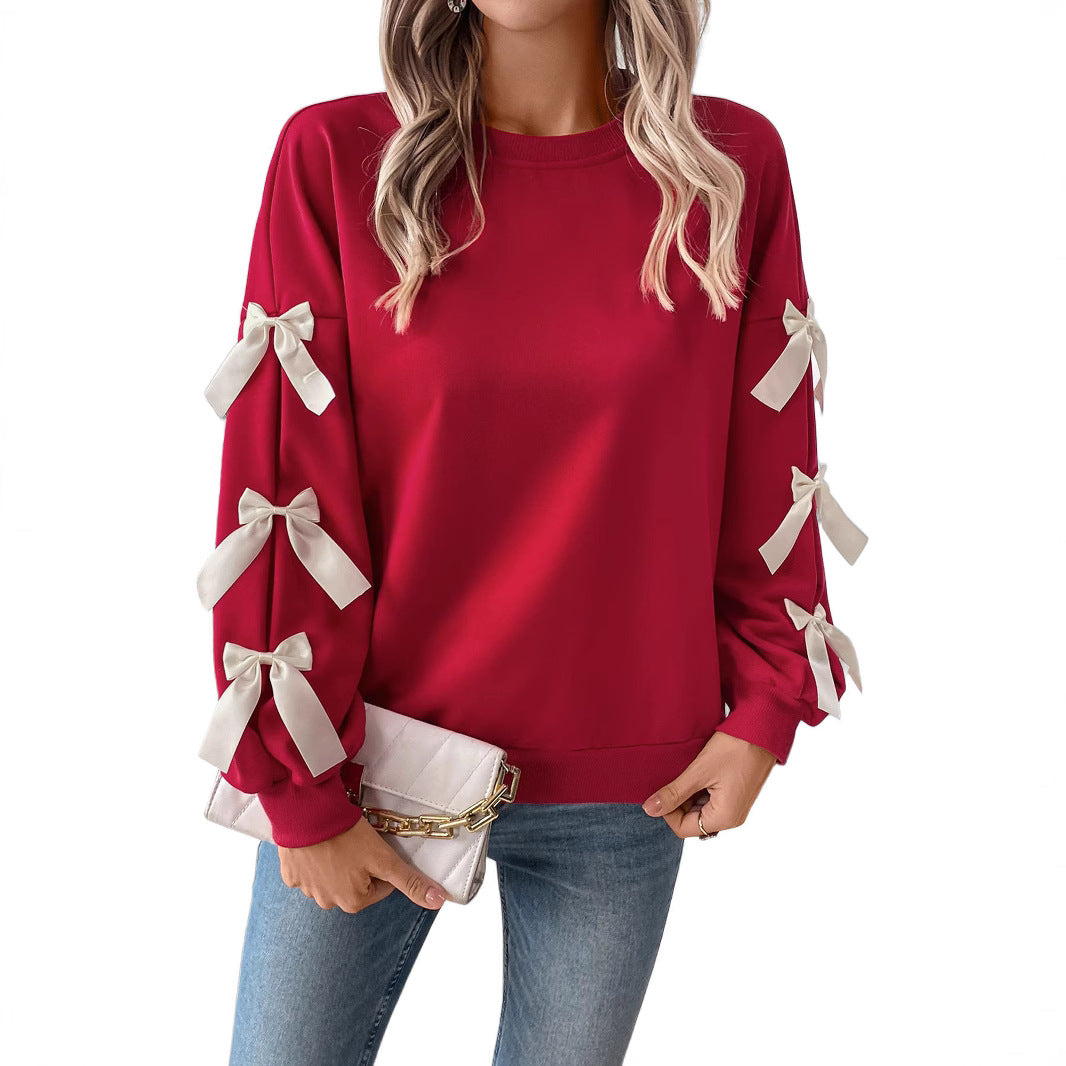 Women's sweatshirt with decorative bows on the sleeves Chichicherry
