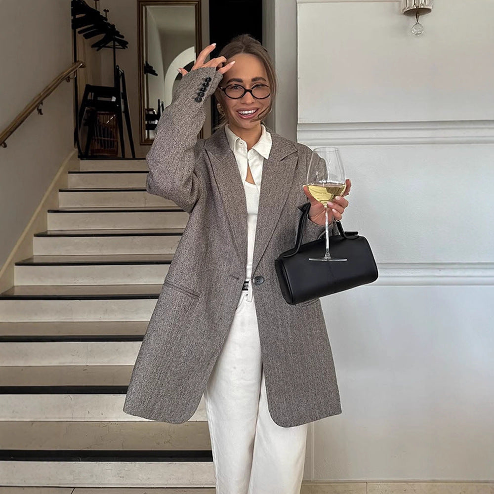 Women's long oversized wool blend coat with single-breasted button placket, notched lapels, and side pockets Chichicherry