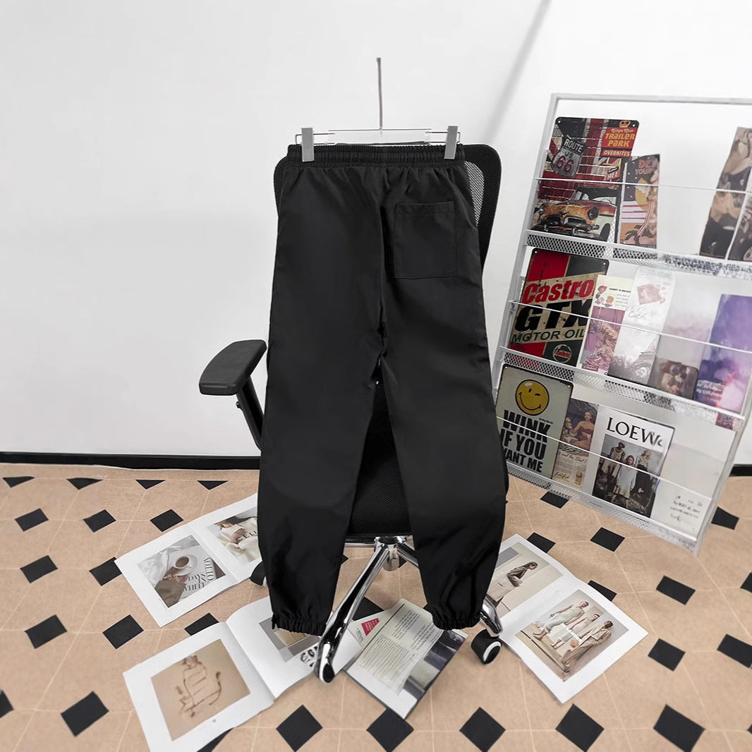 Unisex sporty jogging pants with adjustable waistband and side pockets Chichicherry