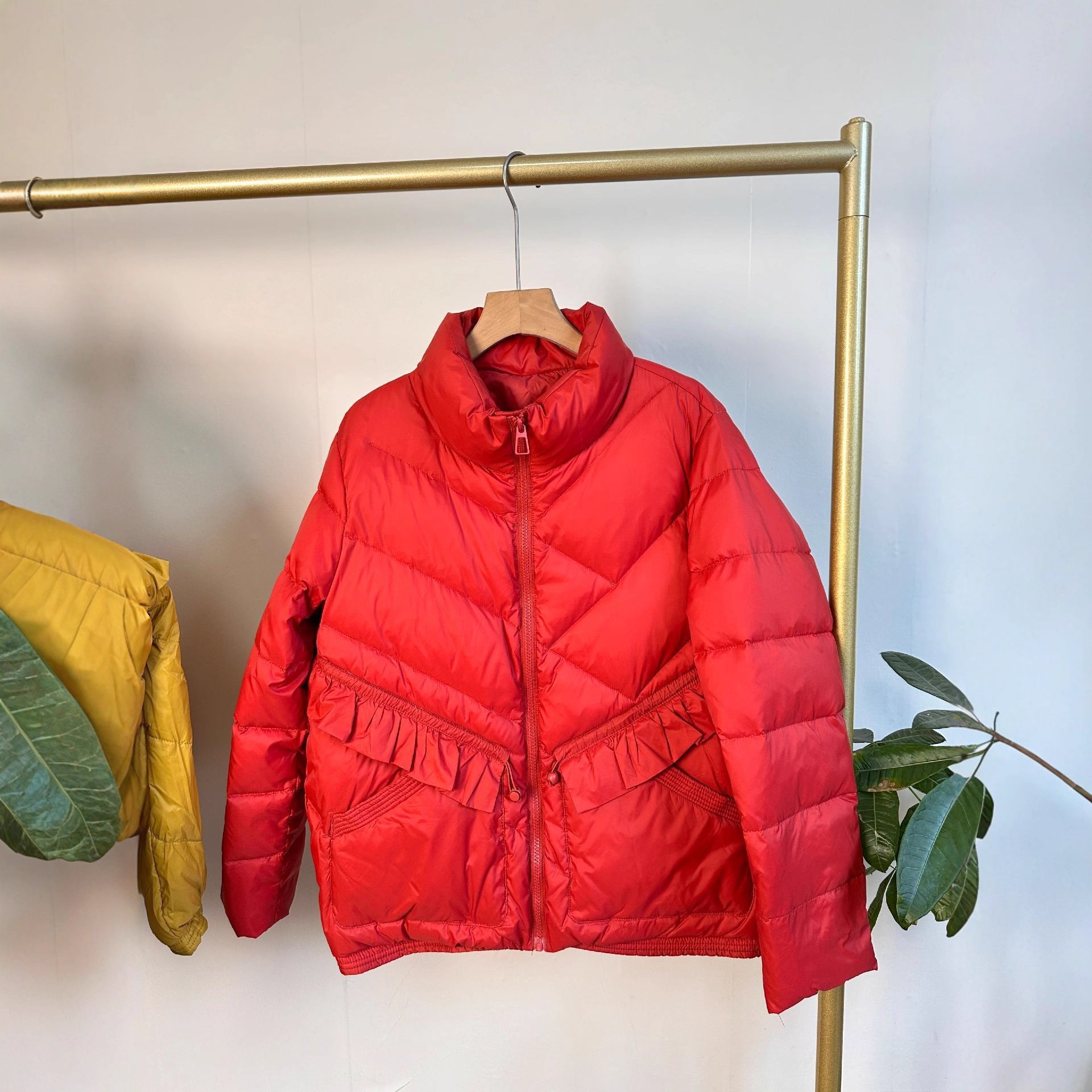 Women's quilted parka with stand-up collar, tailored ruffle detail and thermal insulation Chichicherry