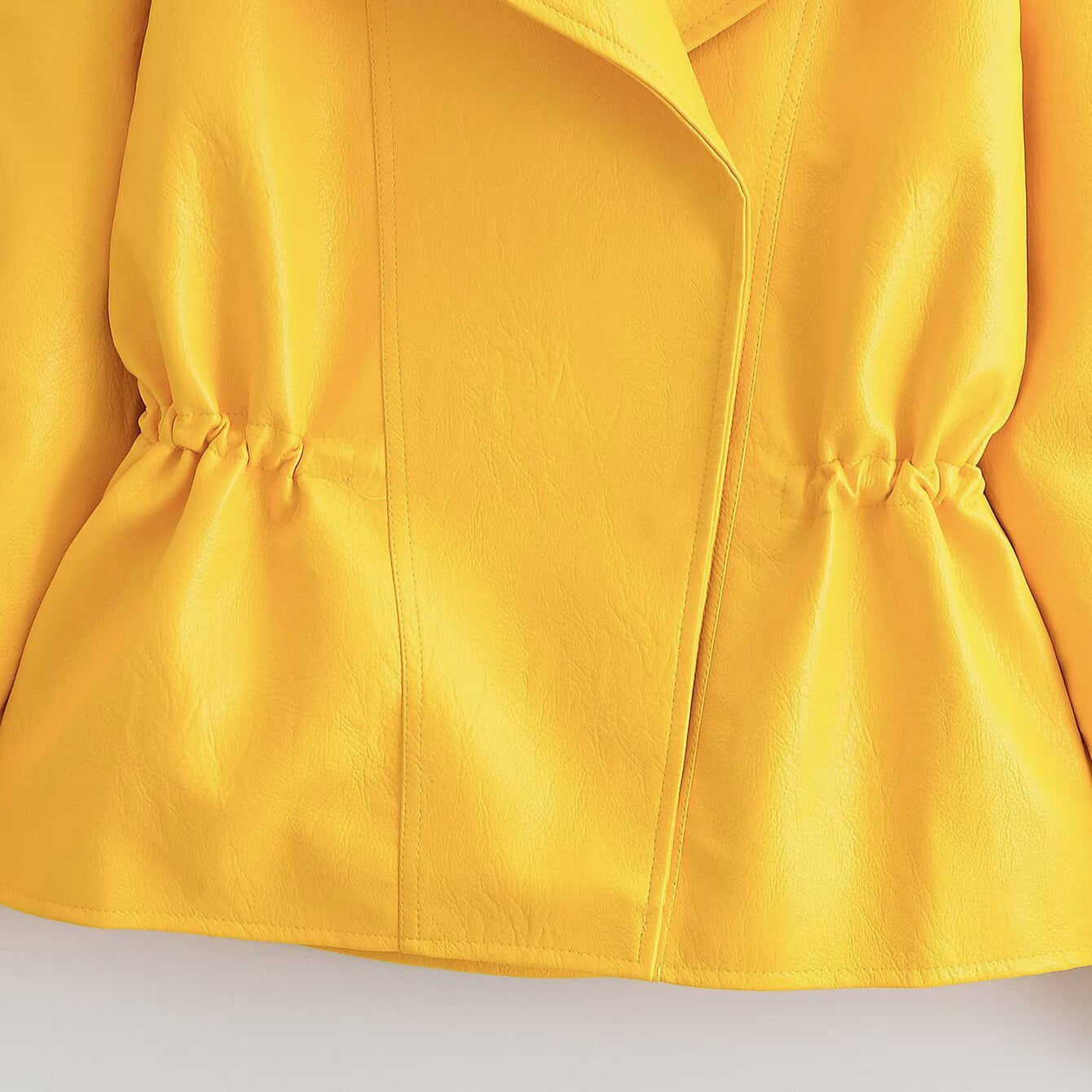 Women Short Faux Leather Jacket with Asymmetrical Lapel and Tailored Drawstring Chichicherry