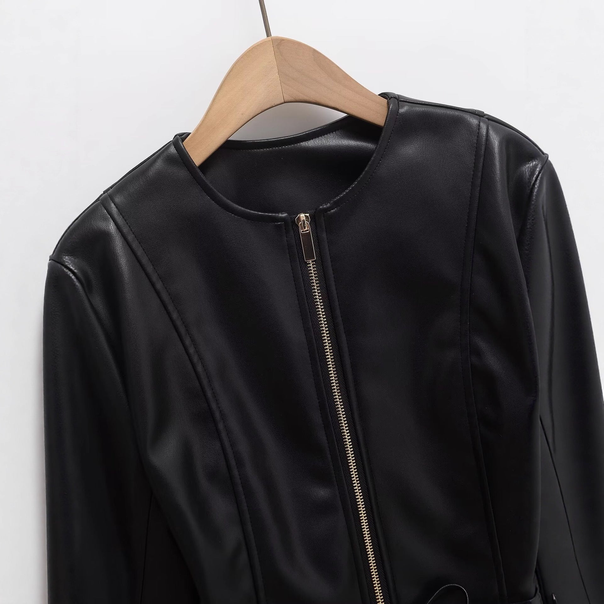 Women's Collarless Faux Leather Jacket with Zipper and Waistband Chichicherry