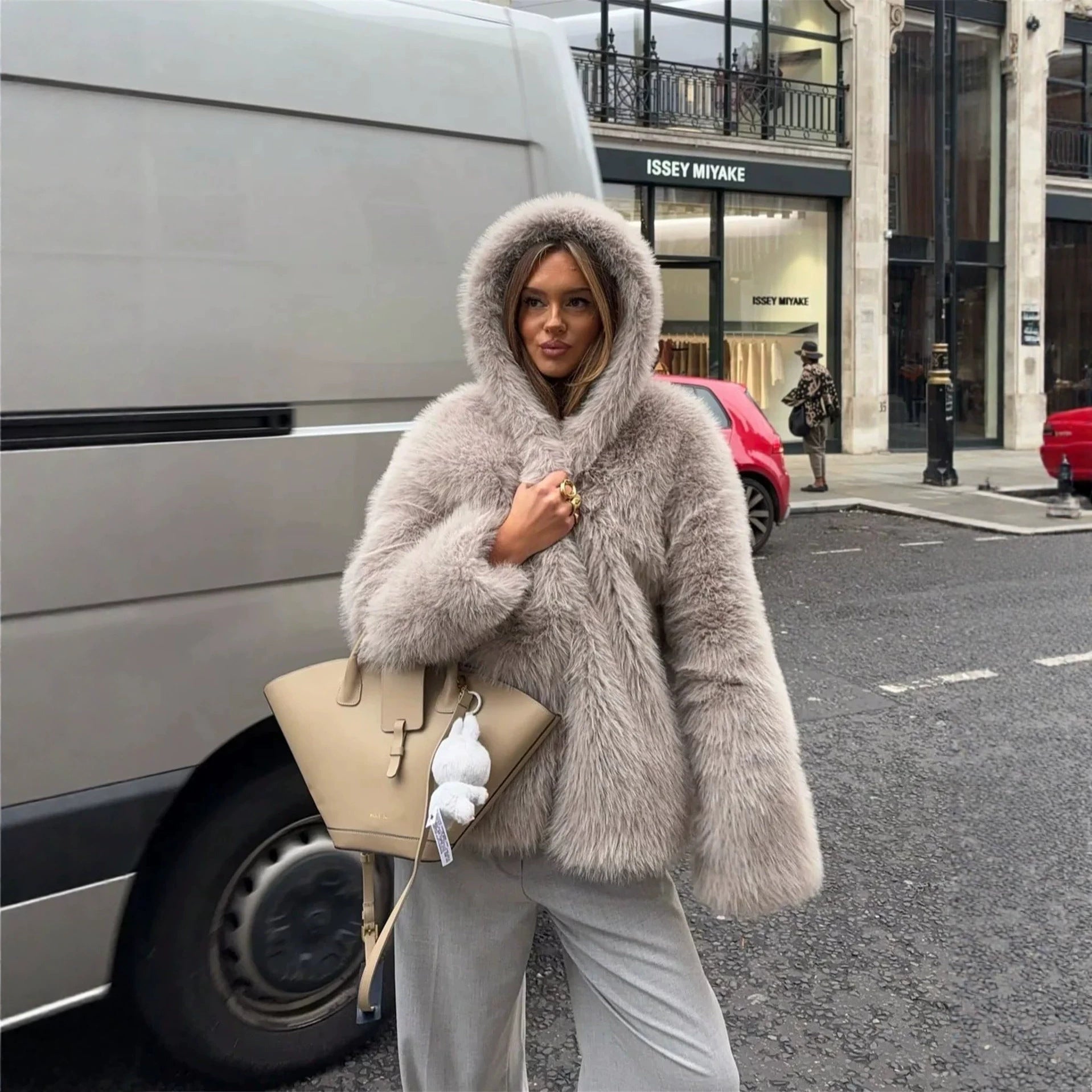 Women's Hooded Faux Fur Short Jacket with Dense Long Pile and Oversize Silhouette Chichicherry
