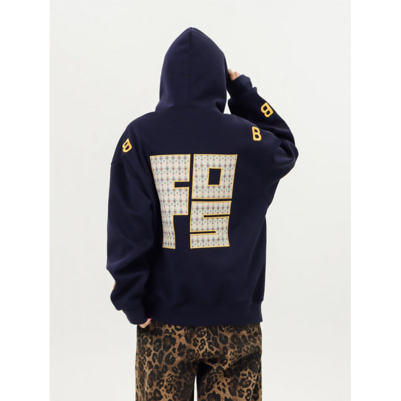 Unisex Oversized Kapuzenpullover mit großflächigem Intarsien‑Blockprint und geripptem Saum Chichicherry