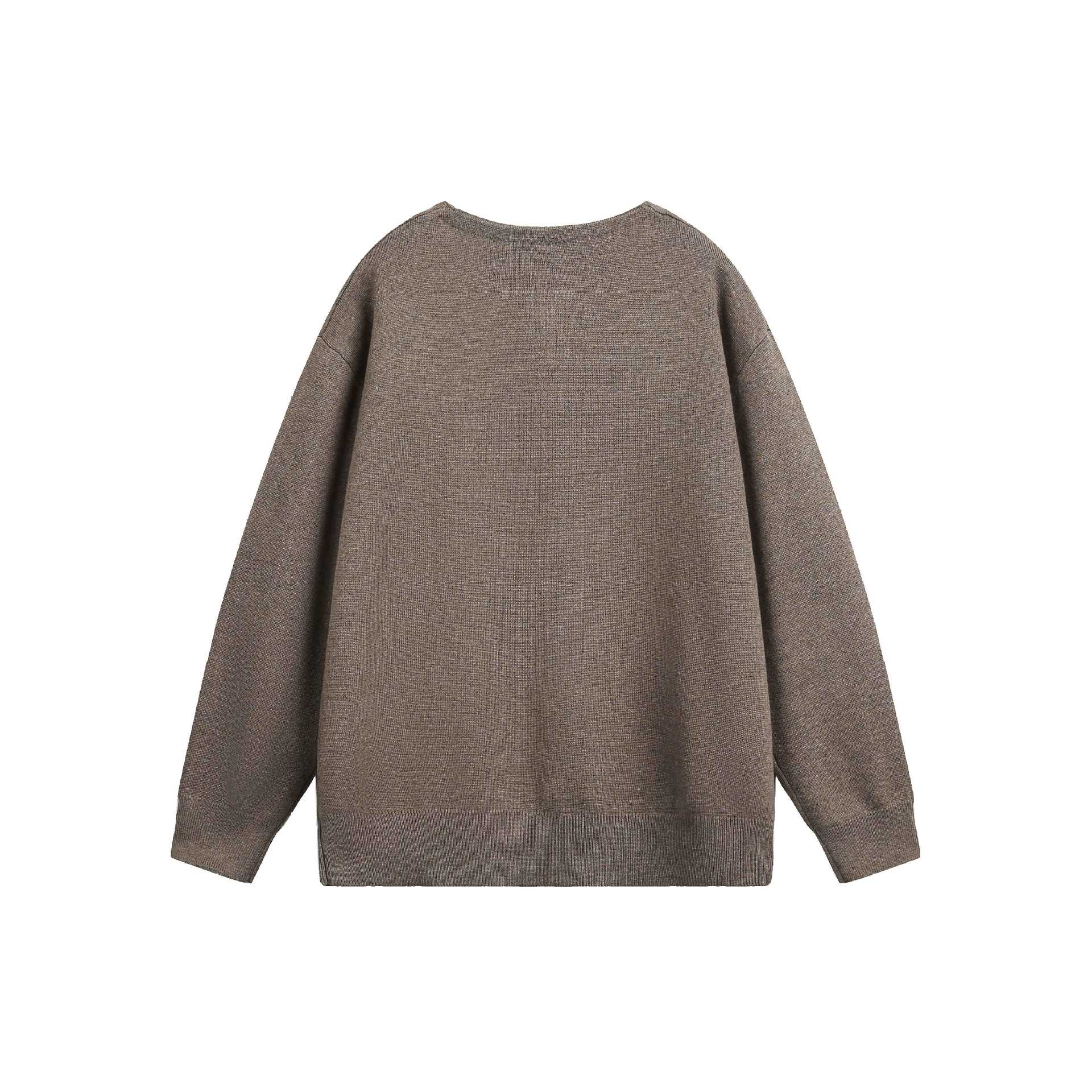 Women's Oversized Knit Sweater with Button Detail at Crew Neck Chichicherry