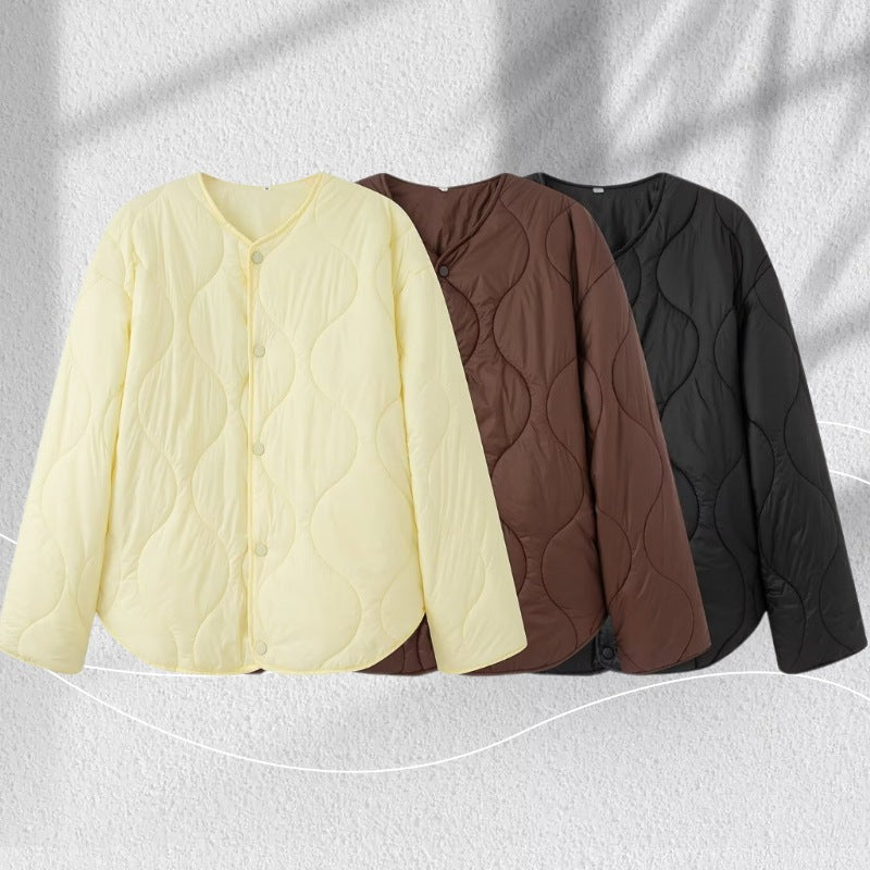 Women's quilted jacket with oversized cut, round neck and curved hem Chichicherry