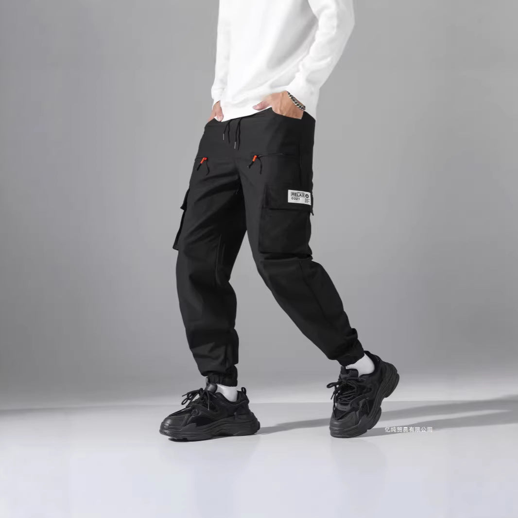 Men's utility cargo pants in jogger style with elastic waistband, multiple pockets & zippered pockets Chichicherry