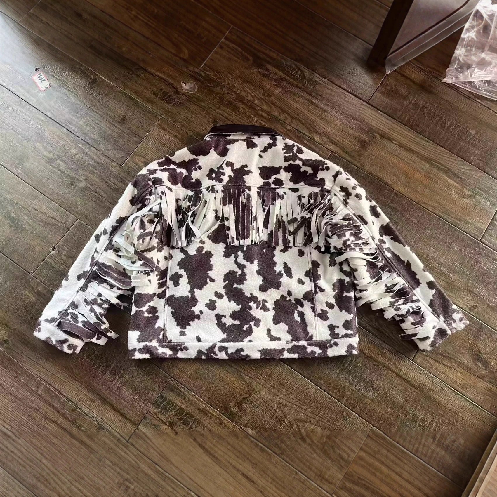 Women’s teddy trucker jacket with cow spot pattern and faux leather collar Chichicherry