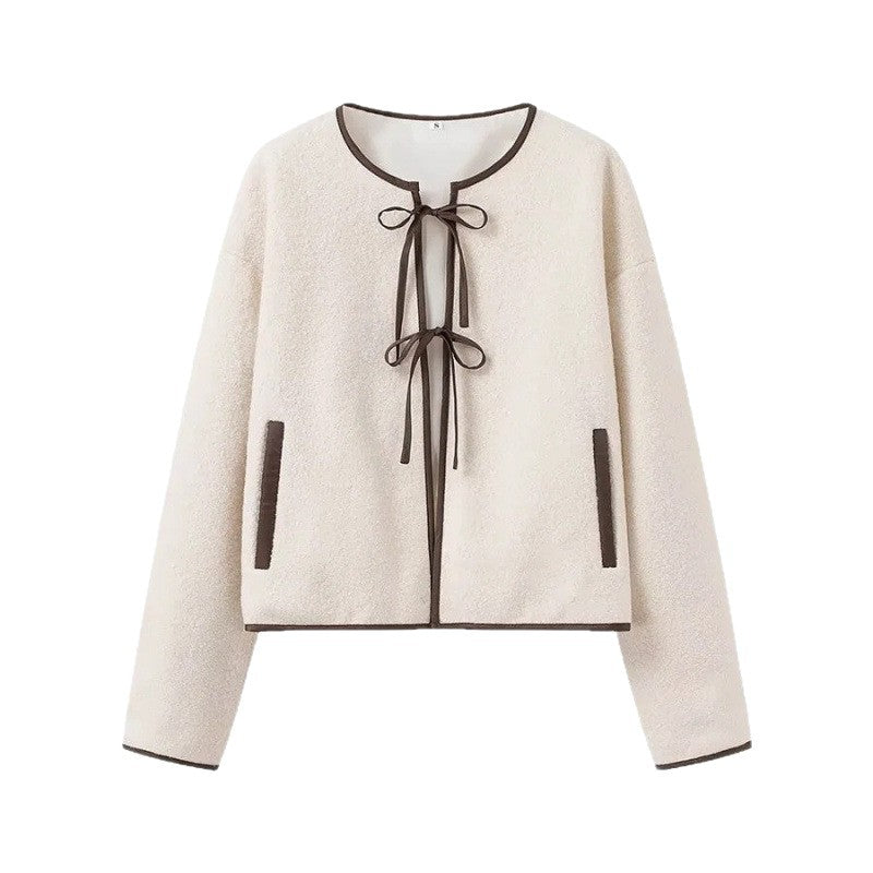 Ladies short cut teddy jacket with tie bands and contrast piping Chichicherry