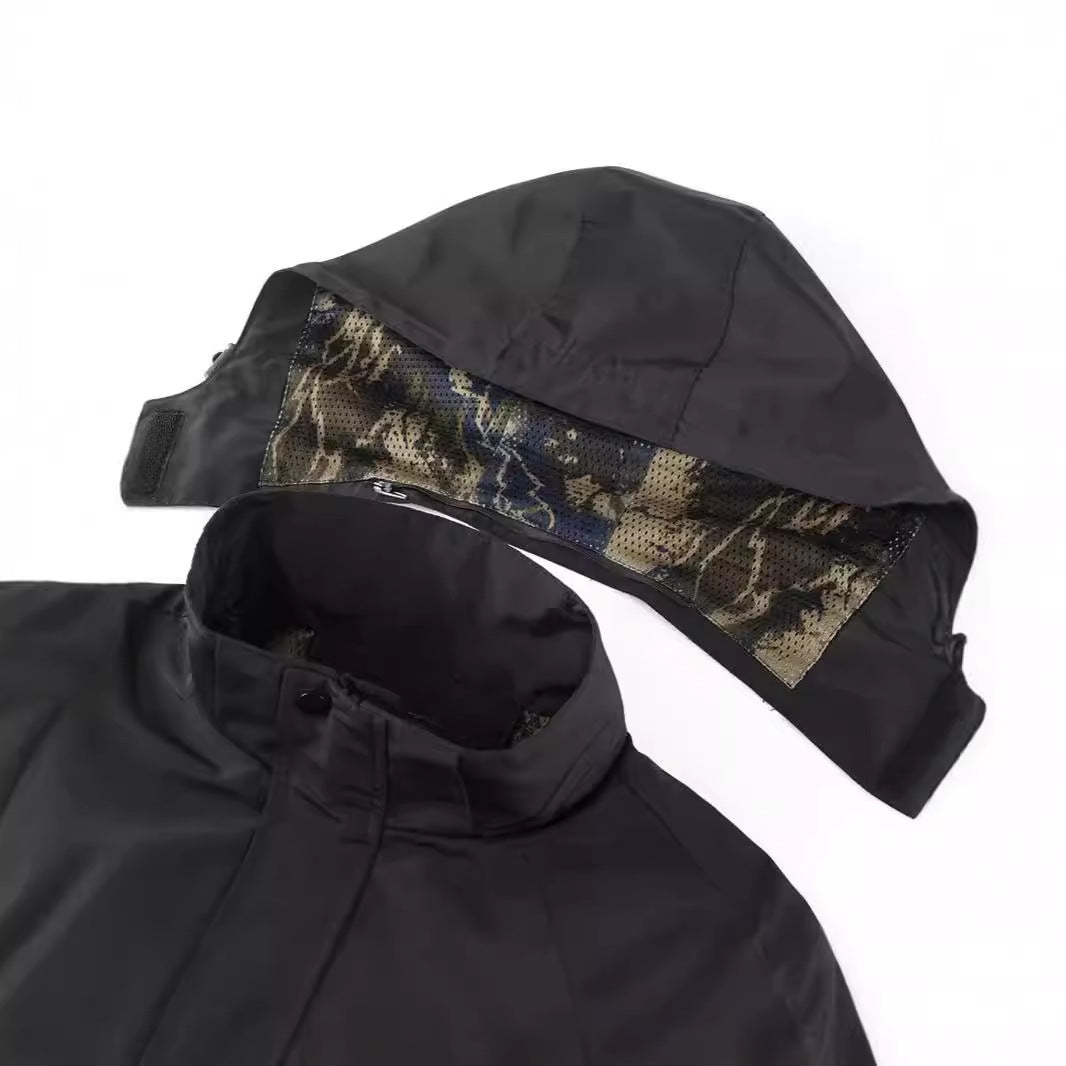 Men's hooded field jacket with camouflage mesh lining and water-repellent utility outer layer Chichicherry