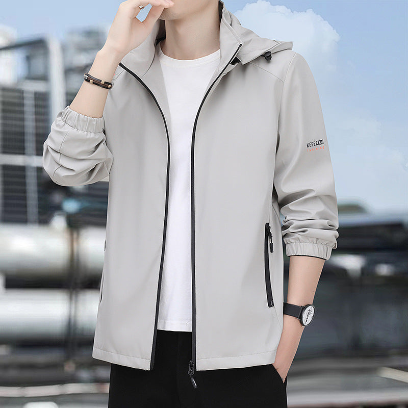 Men's lightweight softshell hoodie jacket with windproof membrane, zip pockets, and elastic cuffs Chichicherry