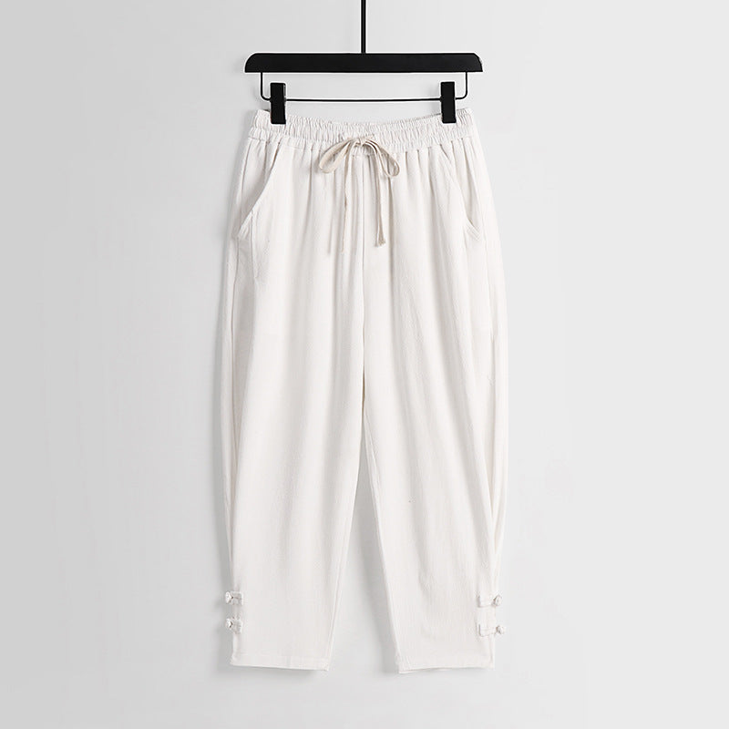 Women's casual jogging pants with drawstring and decorative buttons at the ankle Chichicherry