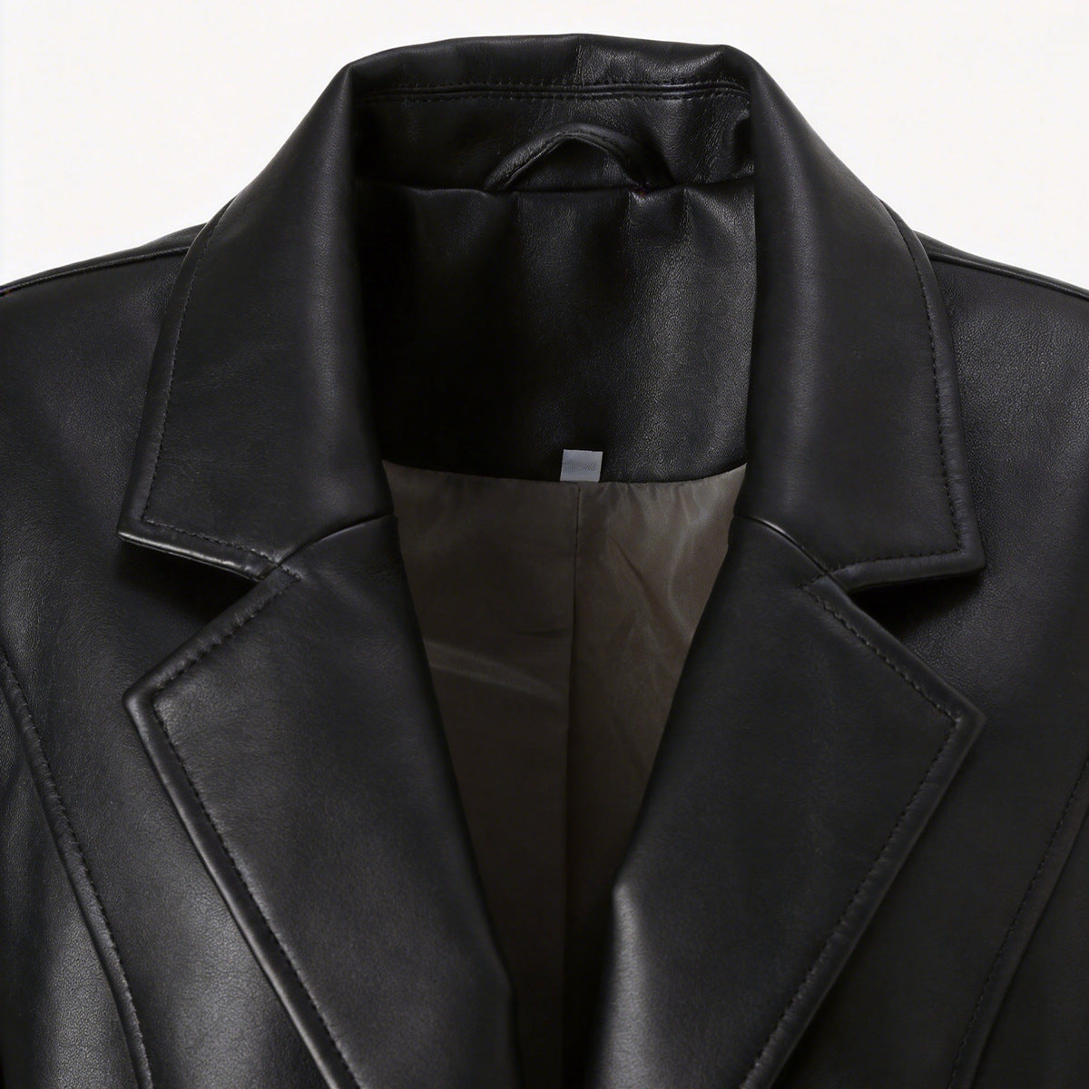 Women's short-cut synthetic leather jacket with round neck and patch pockets Chichicherry