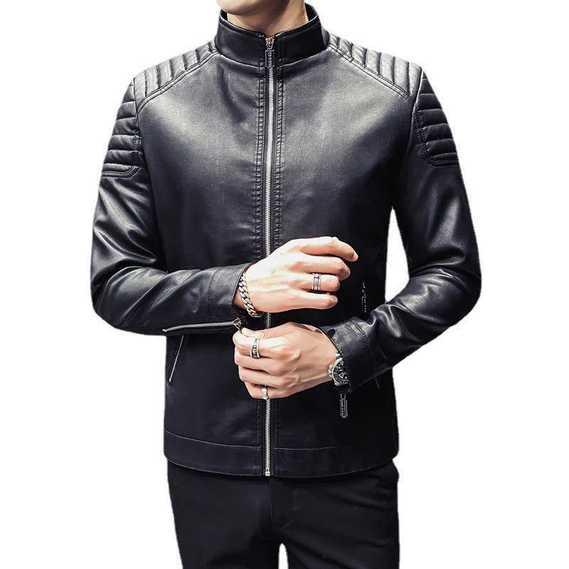 Men's slim faux leather moto jacket with ergonomic seams, ribbed quilt detailing at shoulders and concealed zipper pockets.