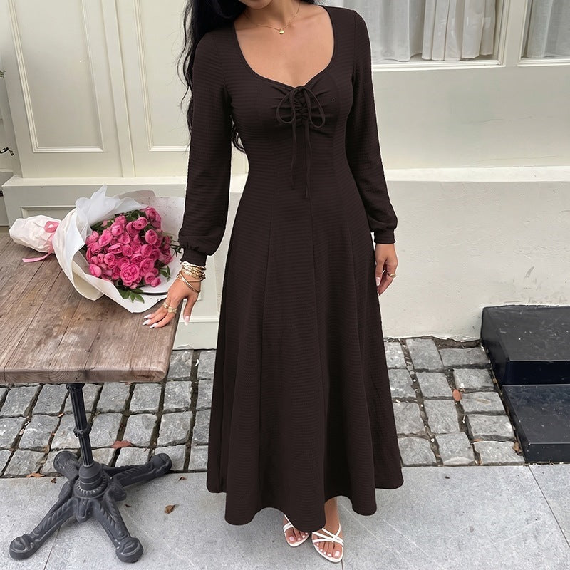 Women's midi dress made of ribbed fine knit with lace-up neckline, fitted A-line and long sleeves