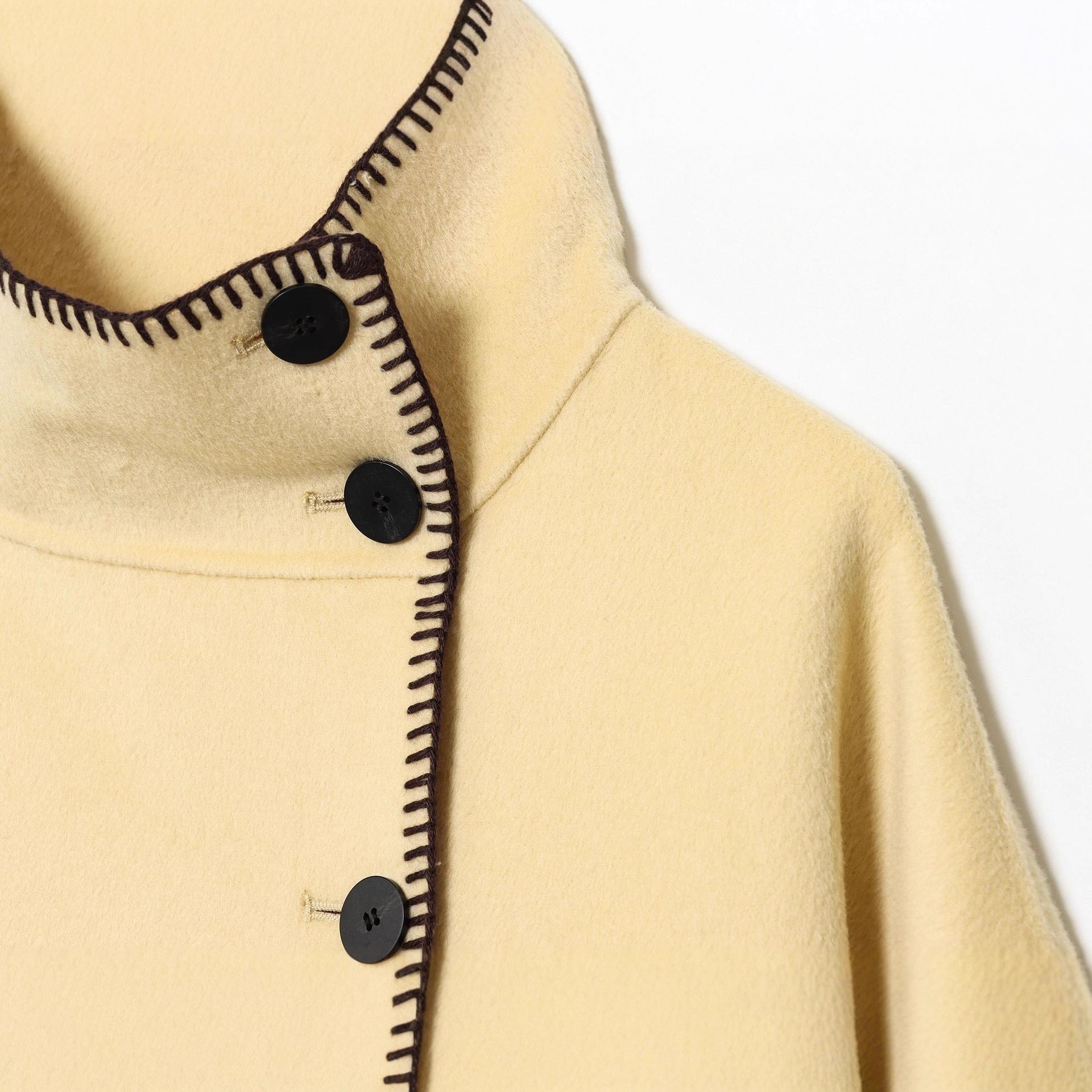 Women's cape coat with stand-up collar, asymmetric button placket and decorative seam Chichicherry