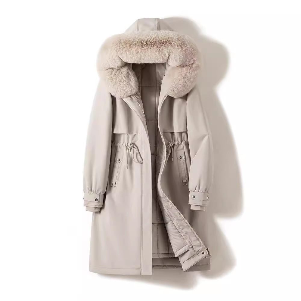 Women's longer water-repellent parka with voluminous faux fur hood, adjustable drawstring waist, and quilted thermal inner jacket Chichicherry