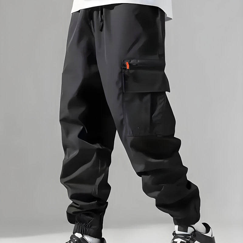 Men's Technical Cargo Pants in Jogger Style with Elastic Waistband, Zipper Utility Pocket & Cuffs Chichicherry