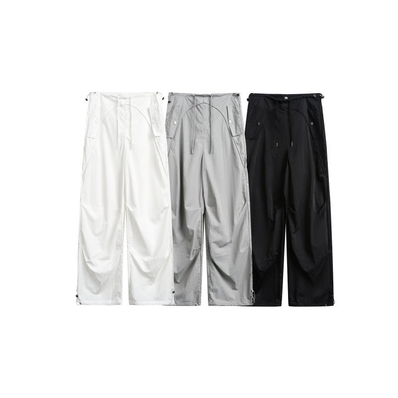 Women's wide cargo pants with drawstring waistband and adjustable hem