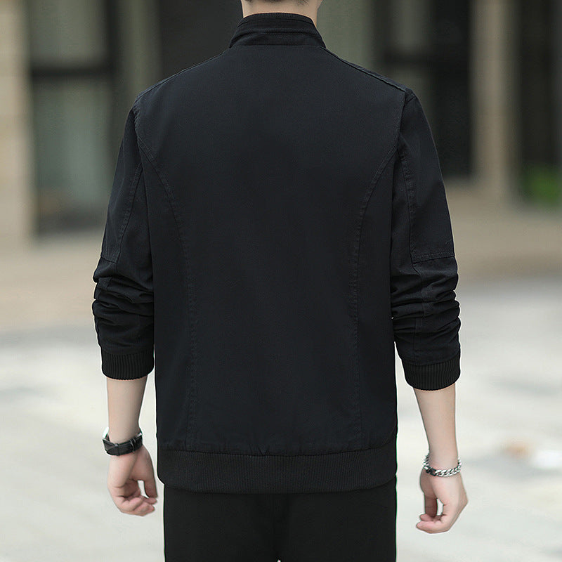 Men's slim-fitting micro canvas bomber with high stand collar, concealed zipper, and elastic ribbed cuffs.