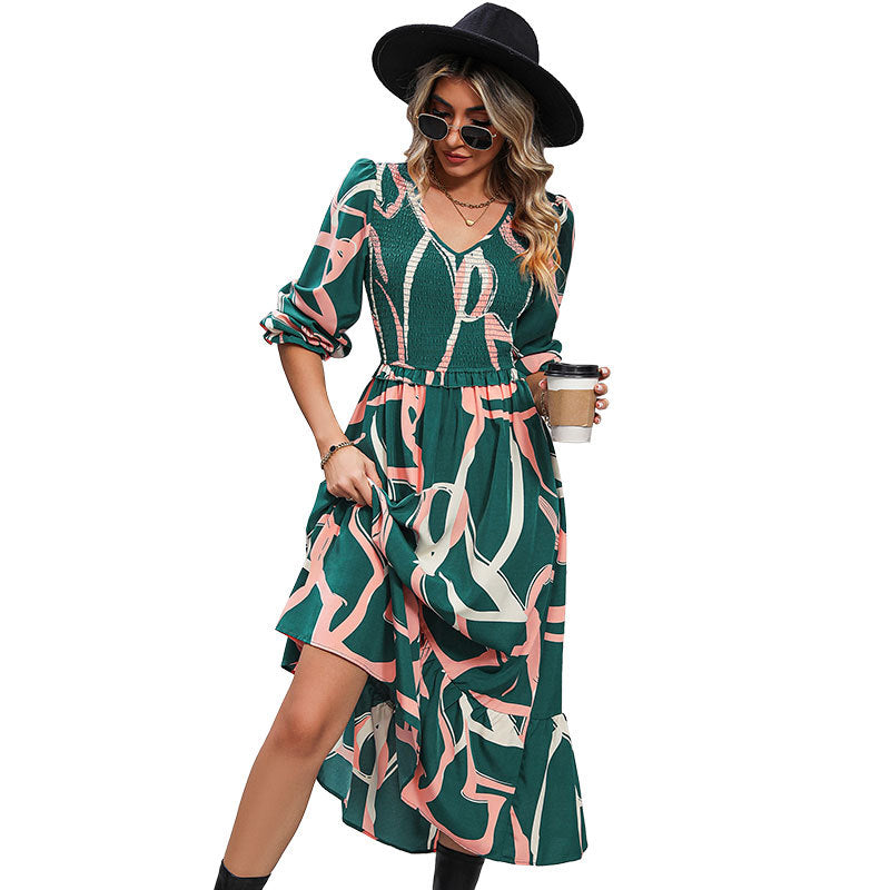 Women's midi dress with gathered smocked bodice, V-neckline and flared ruffle skirt Chichicherry