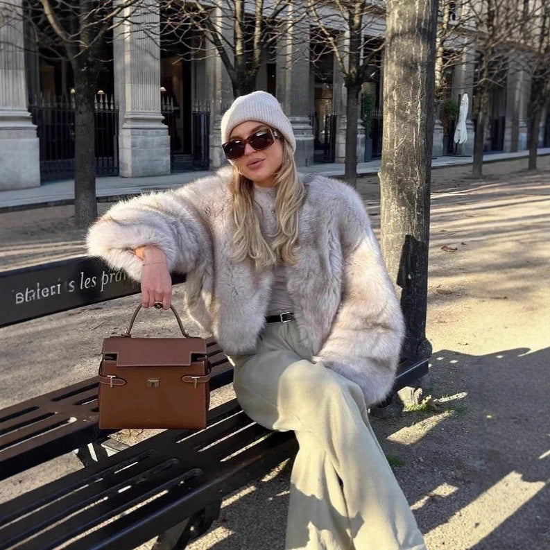 Women's short jacket made of luxurious high-pile faux fur with a boxy silhouette and voluminous sleeves Chichicherry