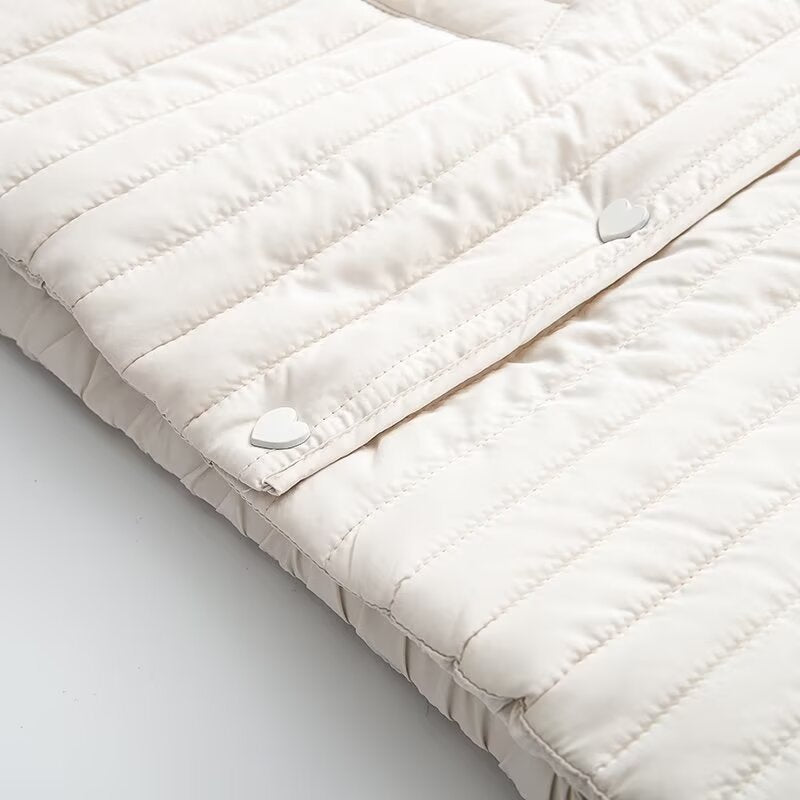 Women's short quilted jacket with vertical quilting, shirt collar and heart button placket Chichicherry