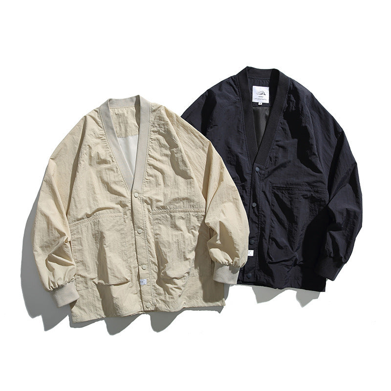 Unisex Oversized Lightweight Transitional Jacket with V-Neck and Snap Button Placket Chichicherry