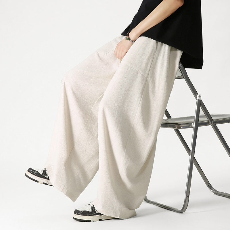 Men's loose-fitting lounge pants with tassel cord, elastic waistband, and patch pockets Chichicherry