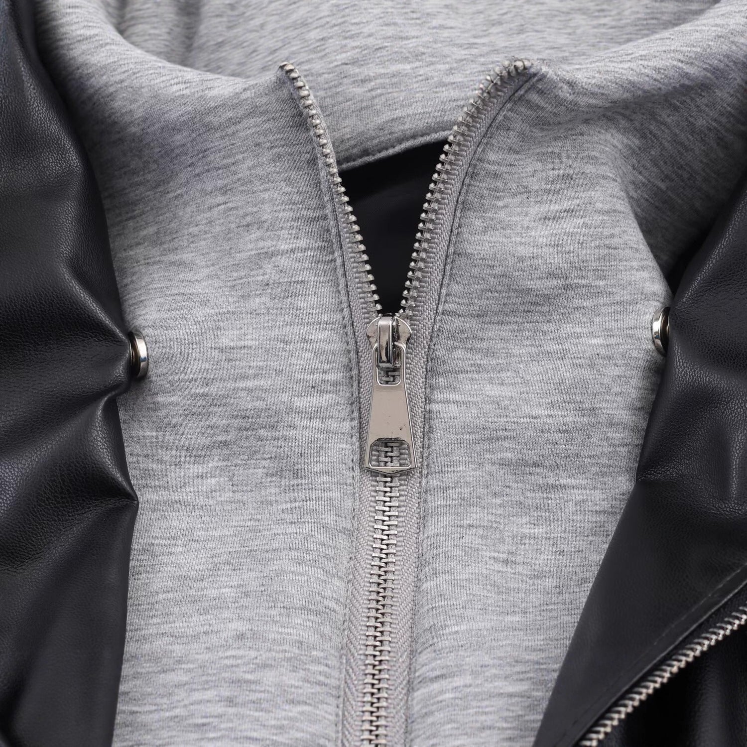 Women's Faux Leather Bomber Jacket with Contrasting Hood in Sweatstyle and Elastic Hem Chichicherry