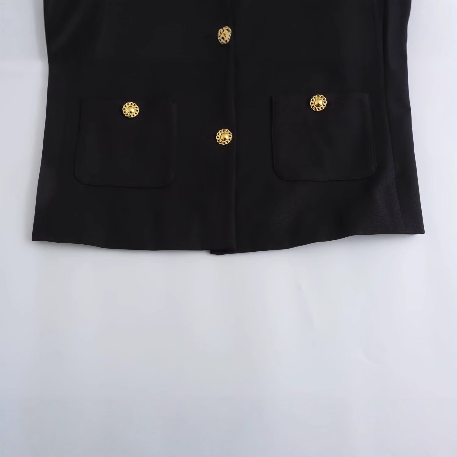 Women’s short blazer in boxy cut with decorative decorative buttons and patch pockets Chichicherry
