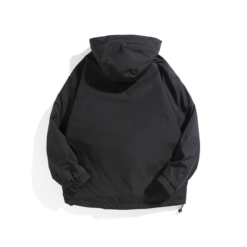 Unisex Wide cut weatherproof parka with hood, drawstring and patch pockets Chichicherry