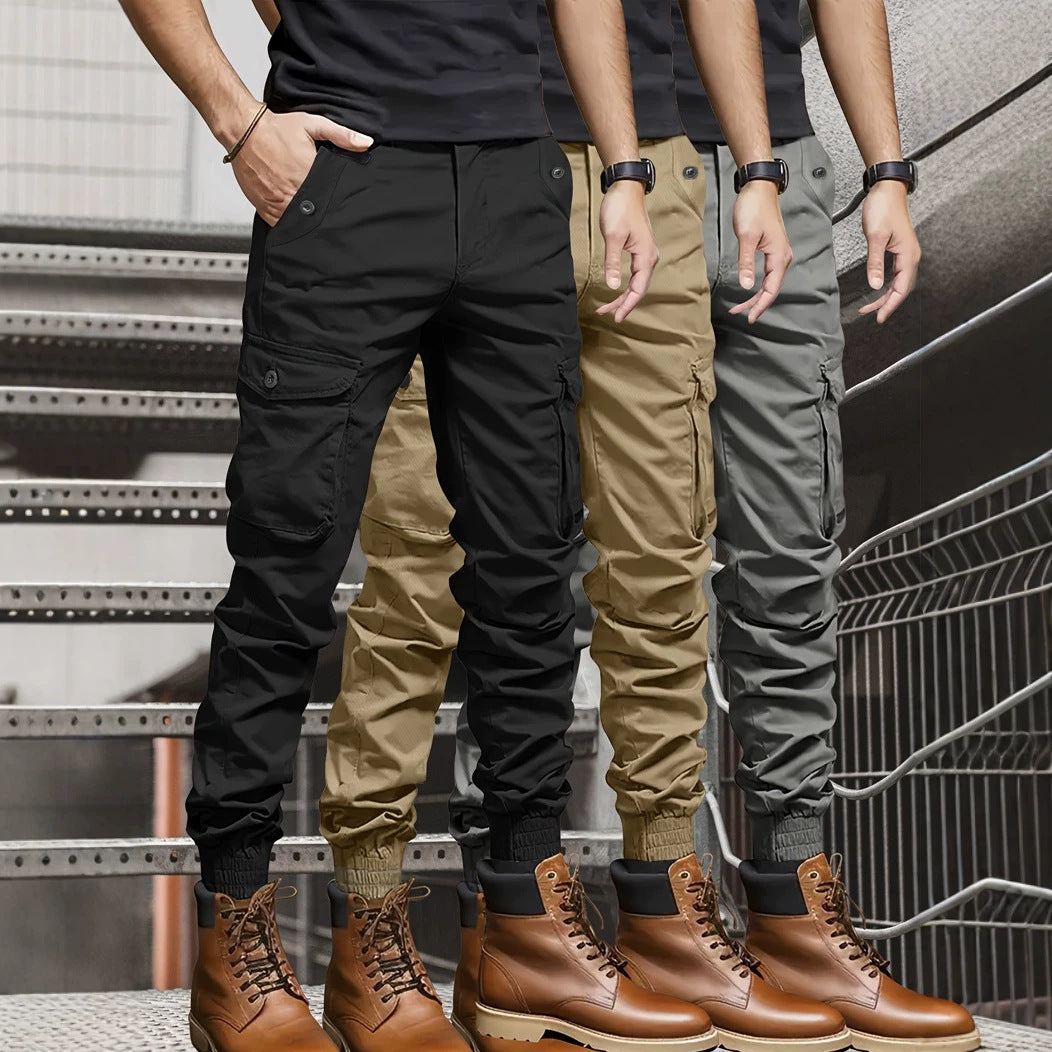 Men's cargo jogger pants with elastic waistband, drawstring, and multifunctional pockets.