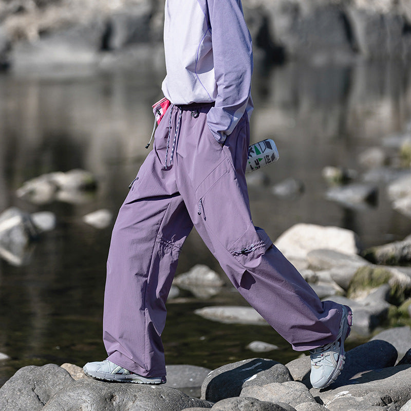 Men's loose technical cargo pants with drawstring, zipper pockets, and adjustable hem Chichicherry