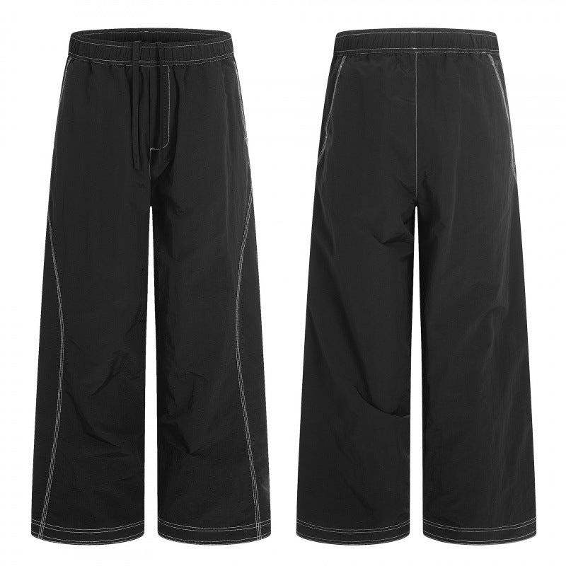 Women's wide pants with elastic waistband, drawstring and contrasting decorative seams Chichicherry