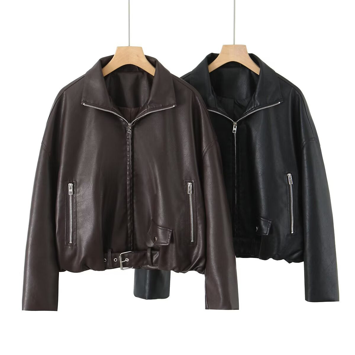 Women’s cropped oversized leather jacket in bomber style with zippered pockets and waist belt Chichicherry