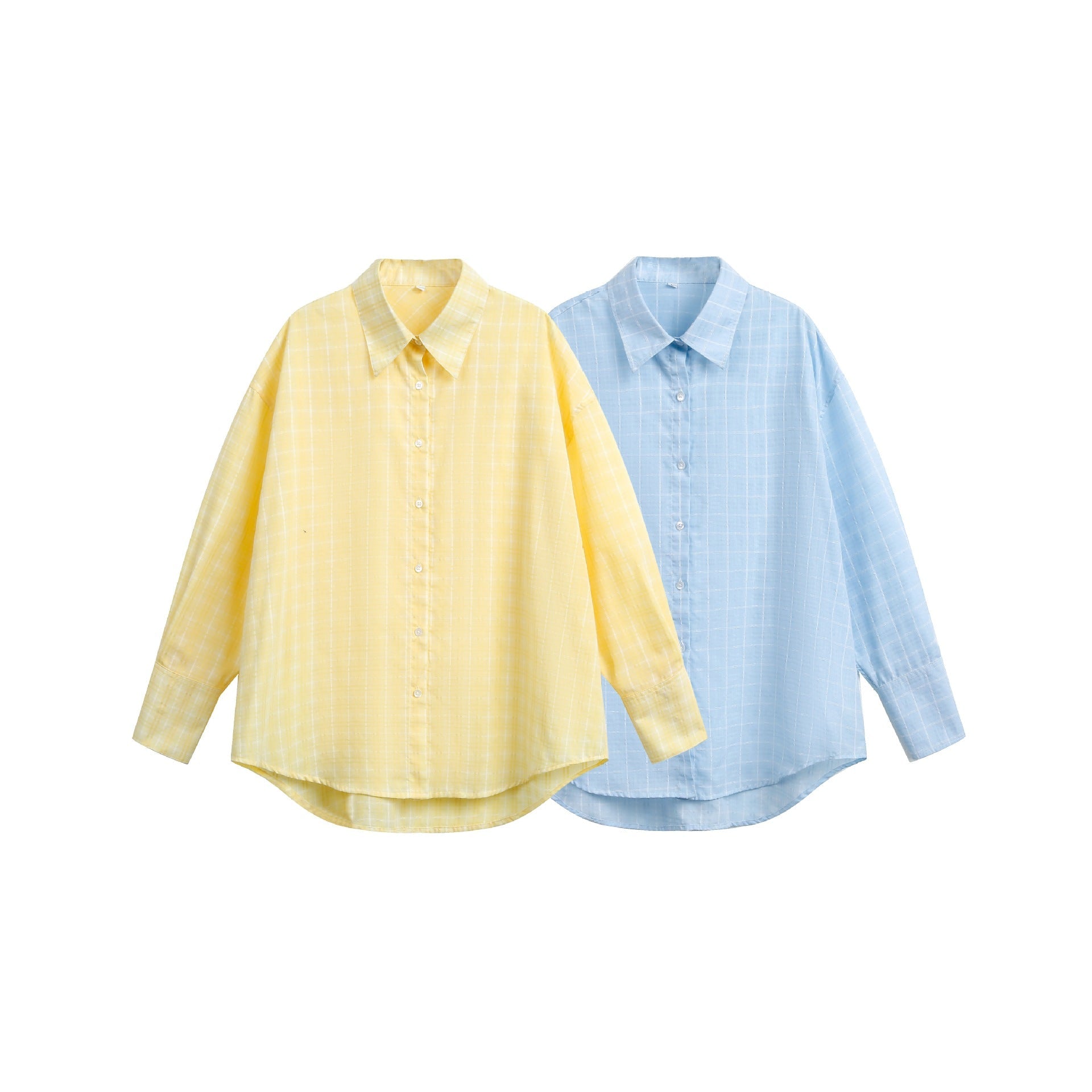 Women's oversized blouse with fine check pattern, drop shoulder and extended back part.