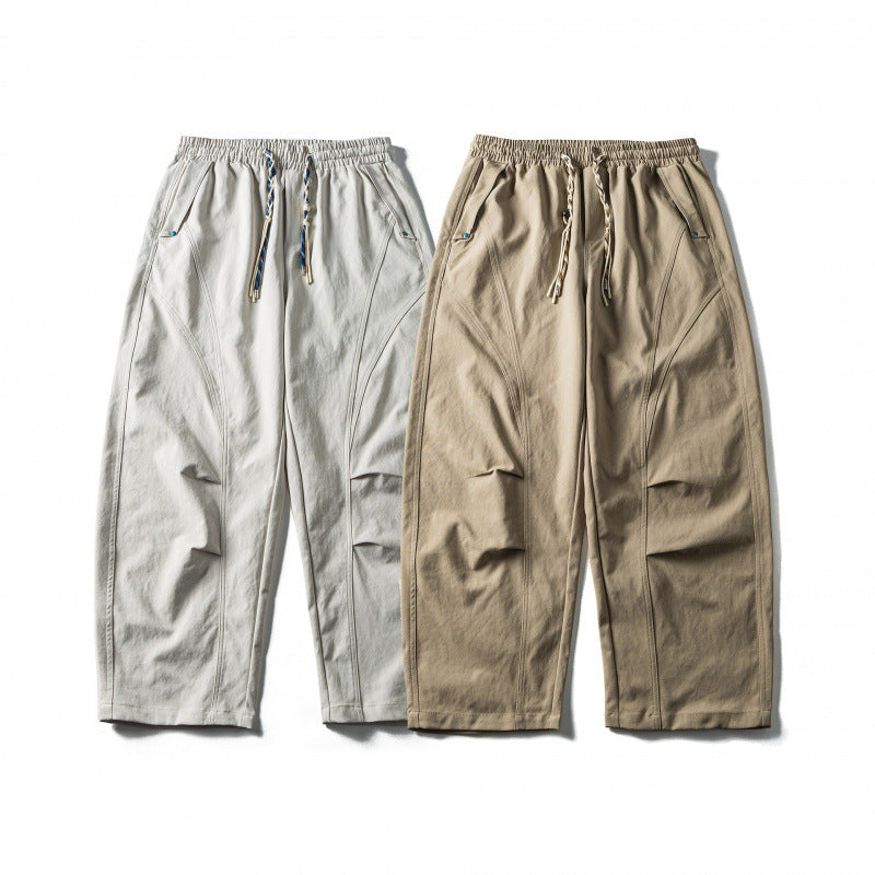 Unisex Wide Cropped Pants with Drawstring, Elastic Waistband and Distinctive Seam Panels Chichicherry