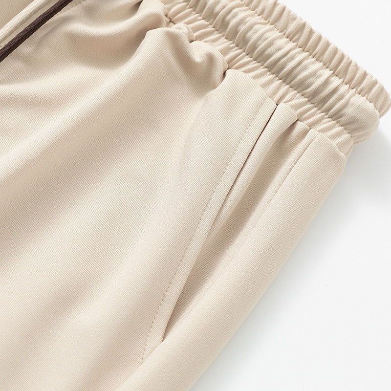Men's Comfort Jogging Pants with sustainable interlock stretch, concealed side pockets & elastic ankle cuffs Chichicherry