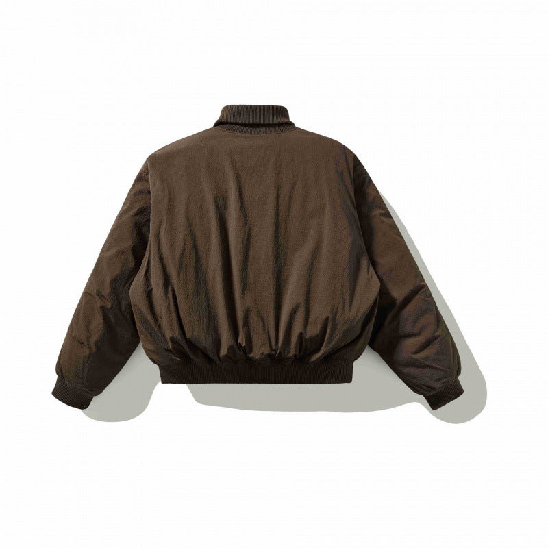 Unisex Short Cut Volume Bomber Jacket with High Ribbed Collar, Concealed Press Stud Placket and Rounded Flap Pockets Chichicherry