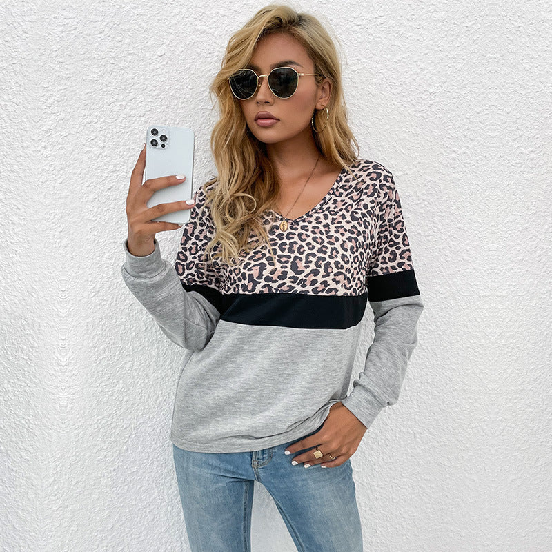 Women's long sleeve shirt with V-neck and leopard print in color block design Chichicherry
