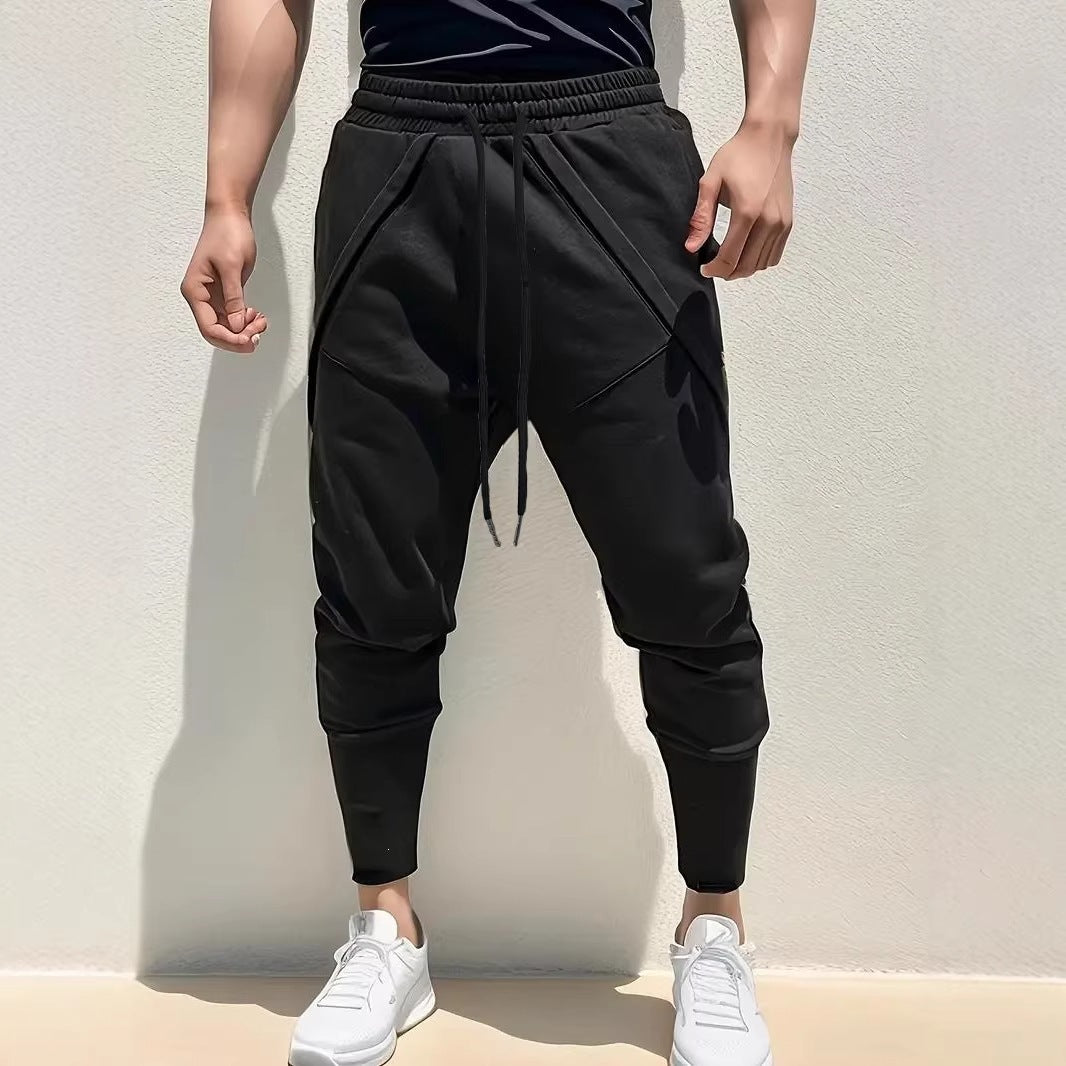 Men's Tapered Jogging Pants with Drop Crotch, Elastic Waistband & Diagonally Placed Pockets Chichicherry